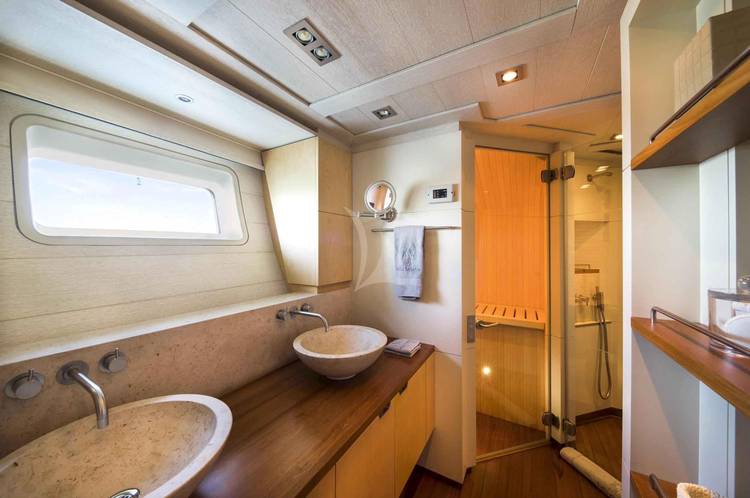 a bathroom with two sinks and a shower unit aboard GUILLEMOT Yacht for Sale