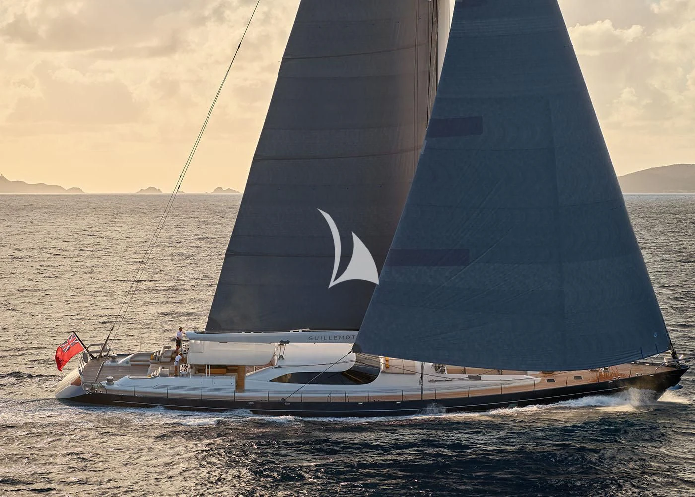 a large sailboat on the water aboard GUILLEMOT Yacht for Sale