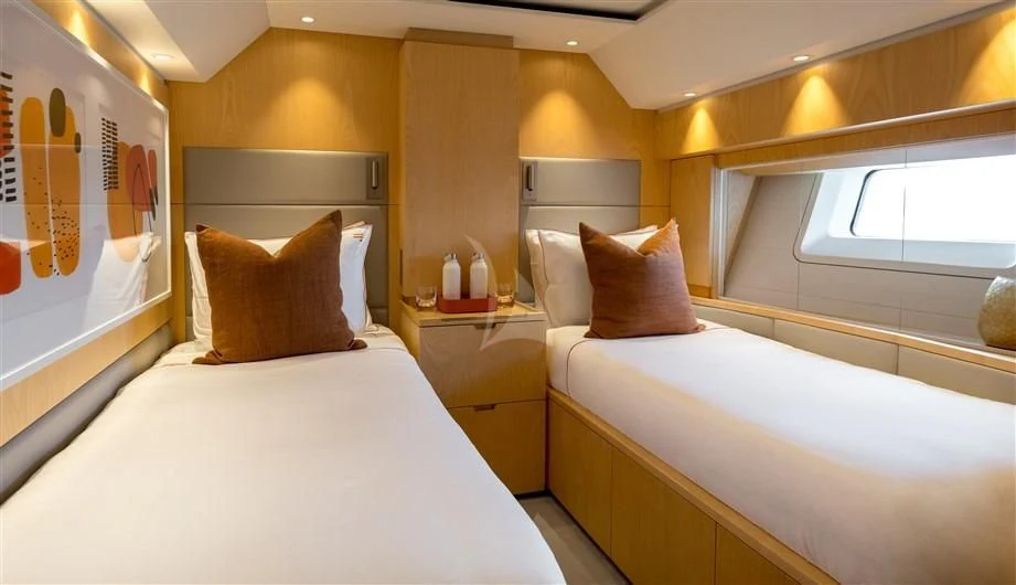 a room with two beds aboard GUILLEMOT Yacht for Sale