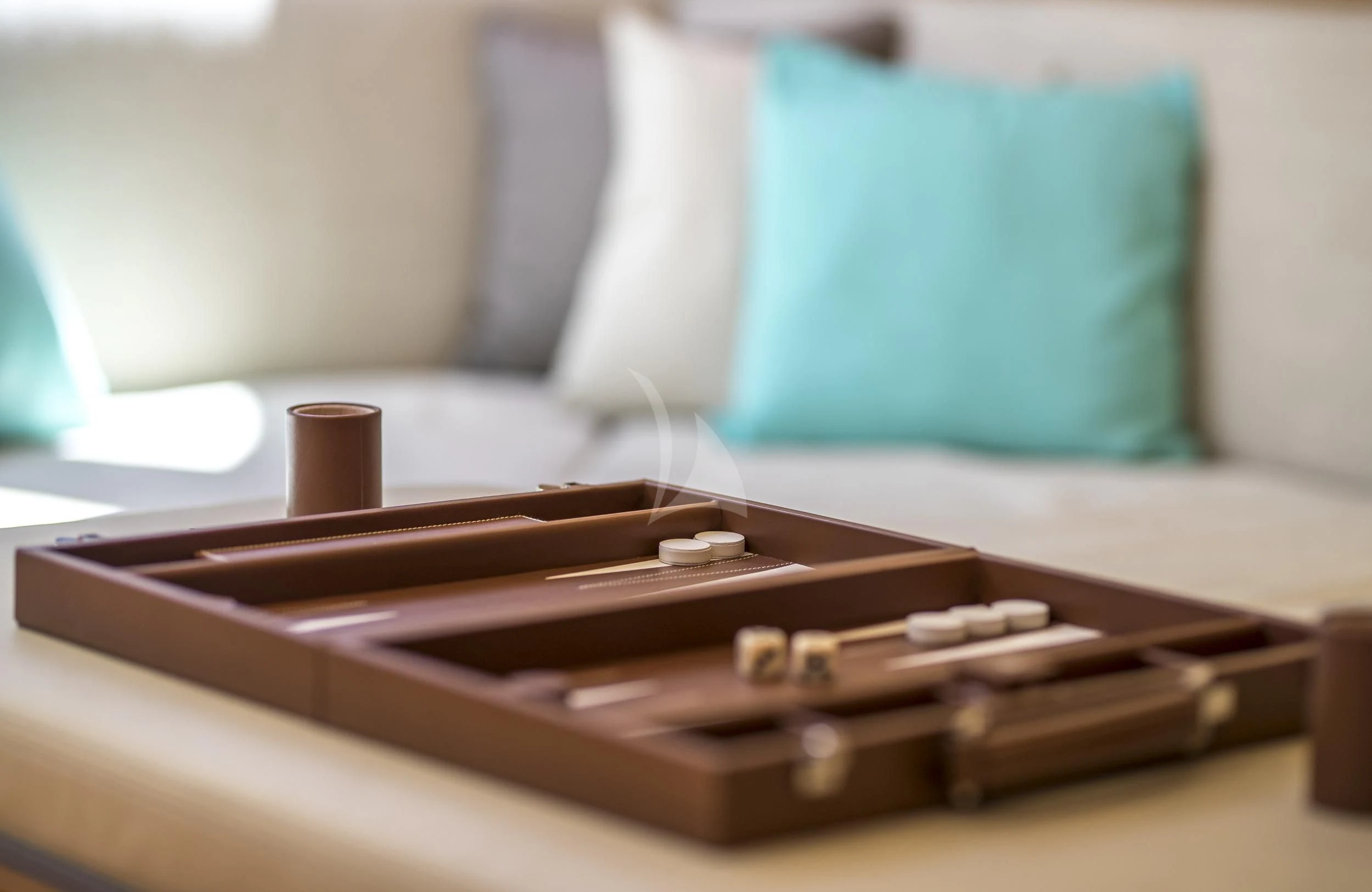 a gun on a table aboard GUILLEMOT Yacht for Sale