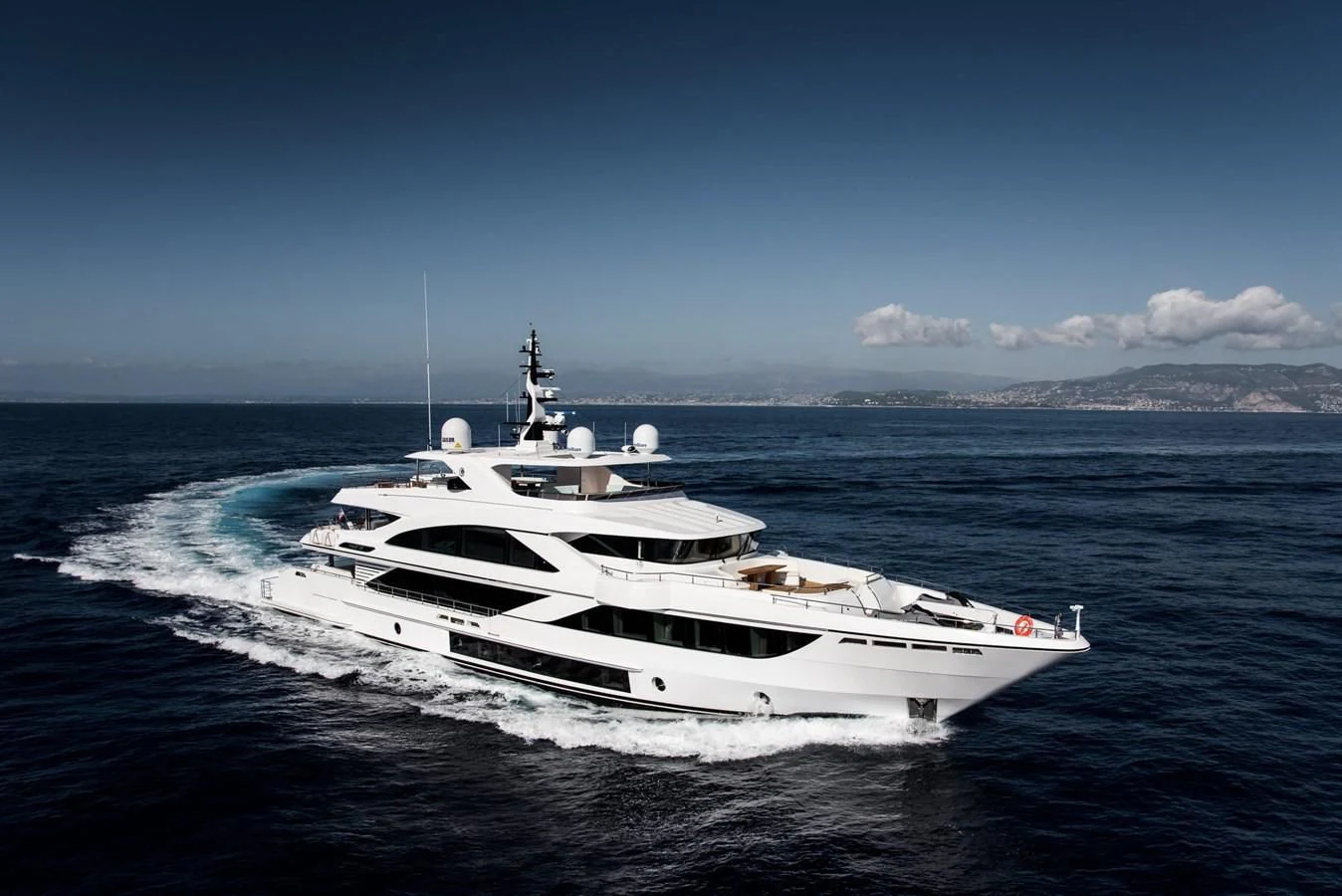 a white yacht on the water aboard MAJESTY 155 Yacht for Sale
