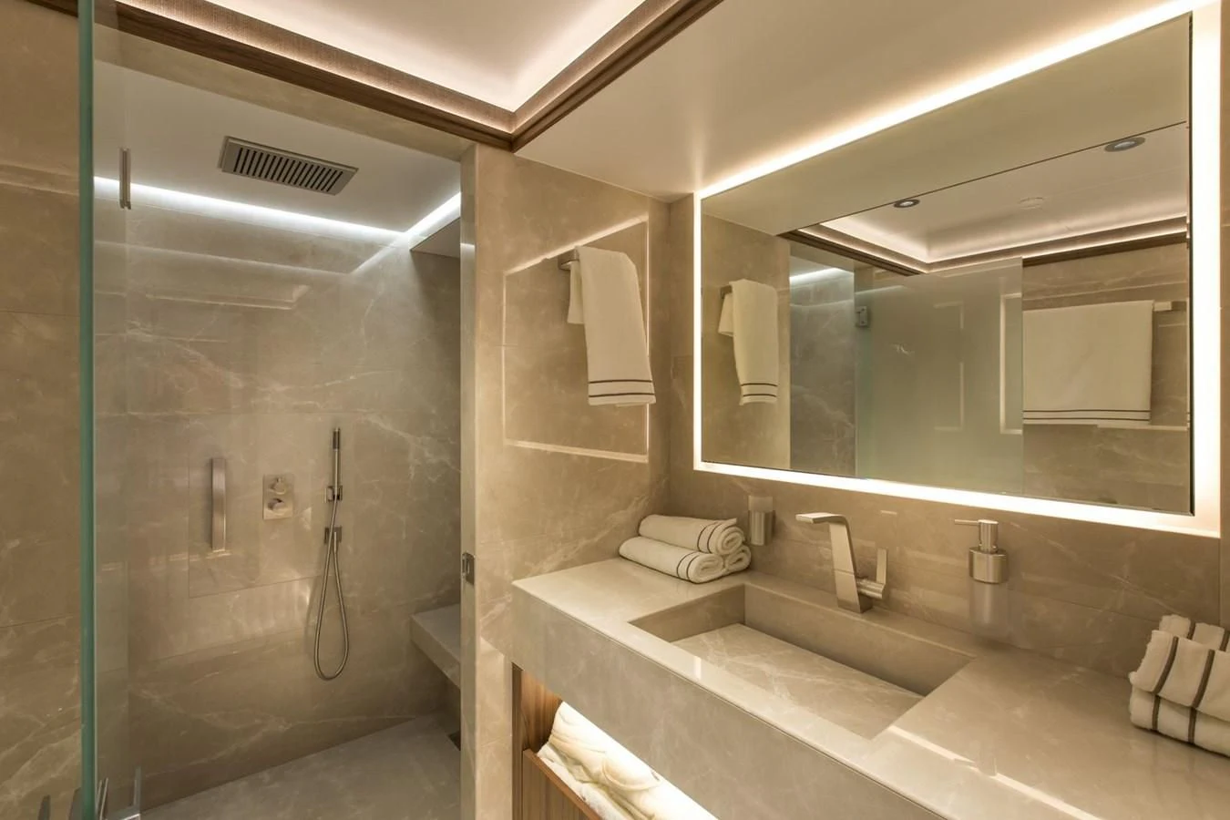 a bathroom with a large mirror aboard MAJESTY 155 Yacht for Sale