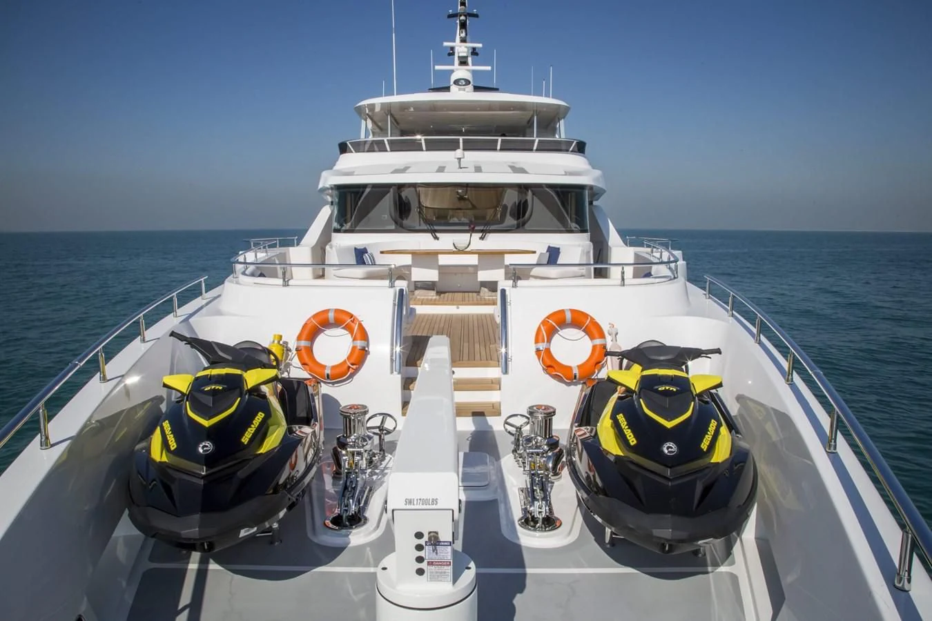 a boat with a yellow and black engine on the front aboard MAJESTY 155 Yacht for Sale
