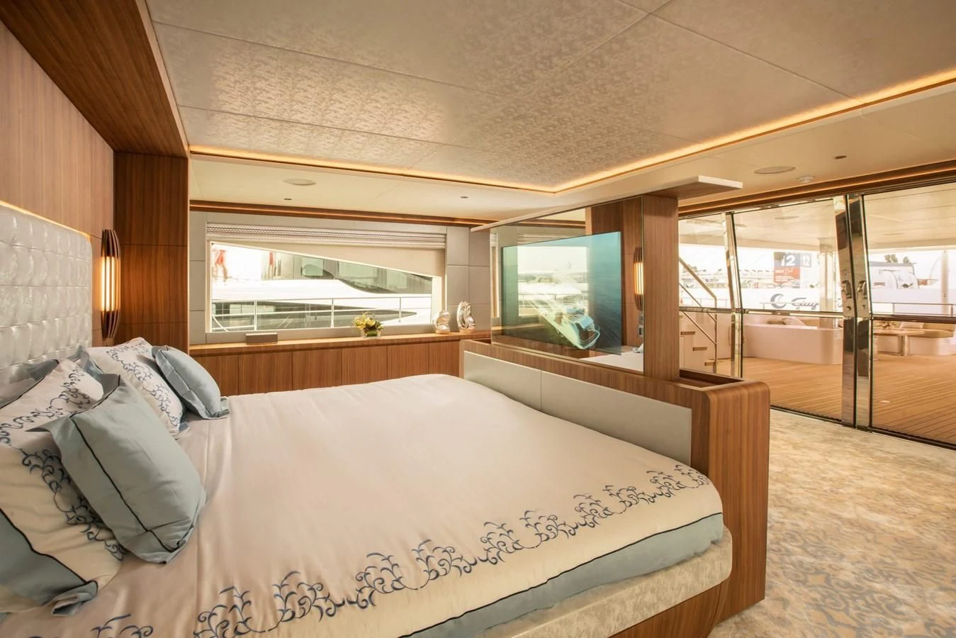 a bedroom with a large bed aboard MAJESTY 155 Yacht for Sale