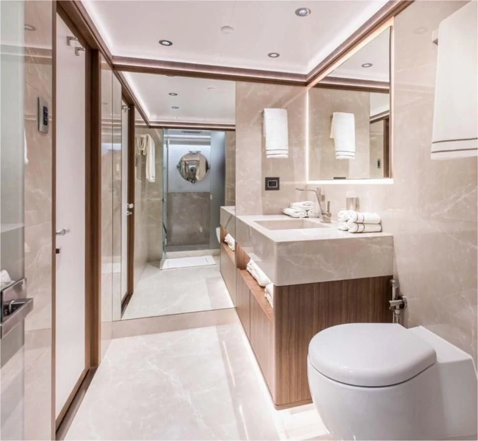 a bathroom with a sink and a toilet aboard MAJESTY 155 Yacht for Sale