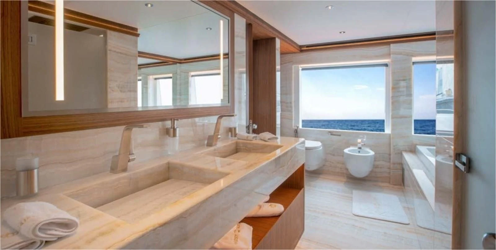 a bathroom with a large window aboard MAJESTY 155 Yacht for Sale