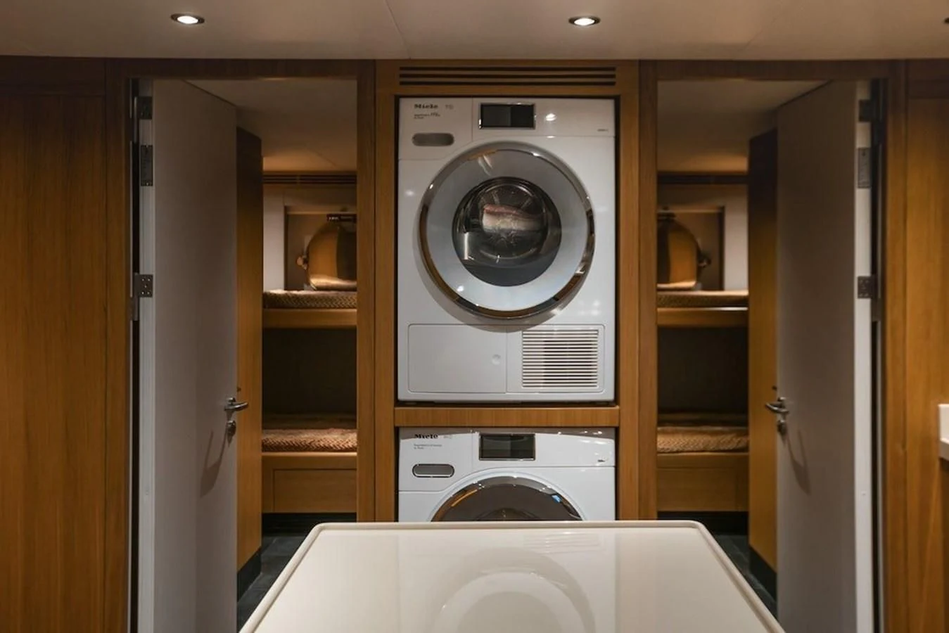 a washing machine in a room aboard MAJESTY 155 Yacht for Sale