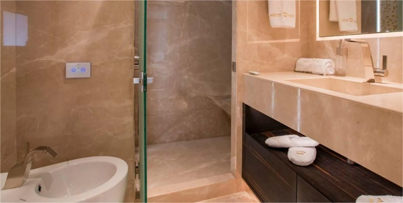 a bathroom with a glass shower aboard MAJESTY 155 Yacht for Sale