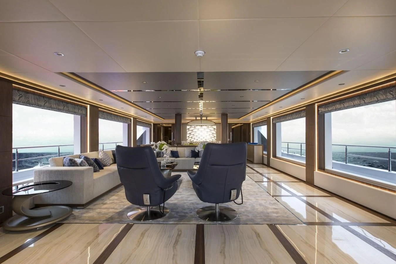 a living room with a large window aboard MAJESTY 155 Yacht for Sale