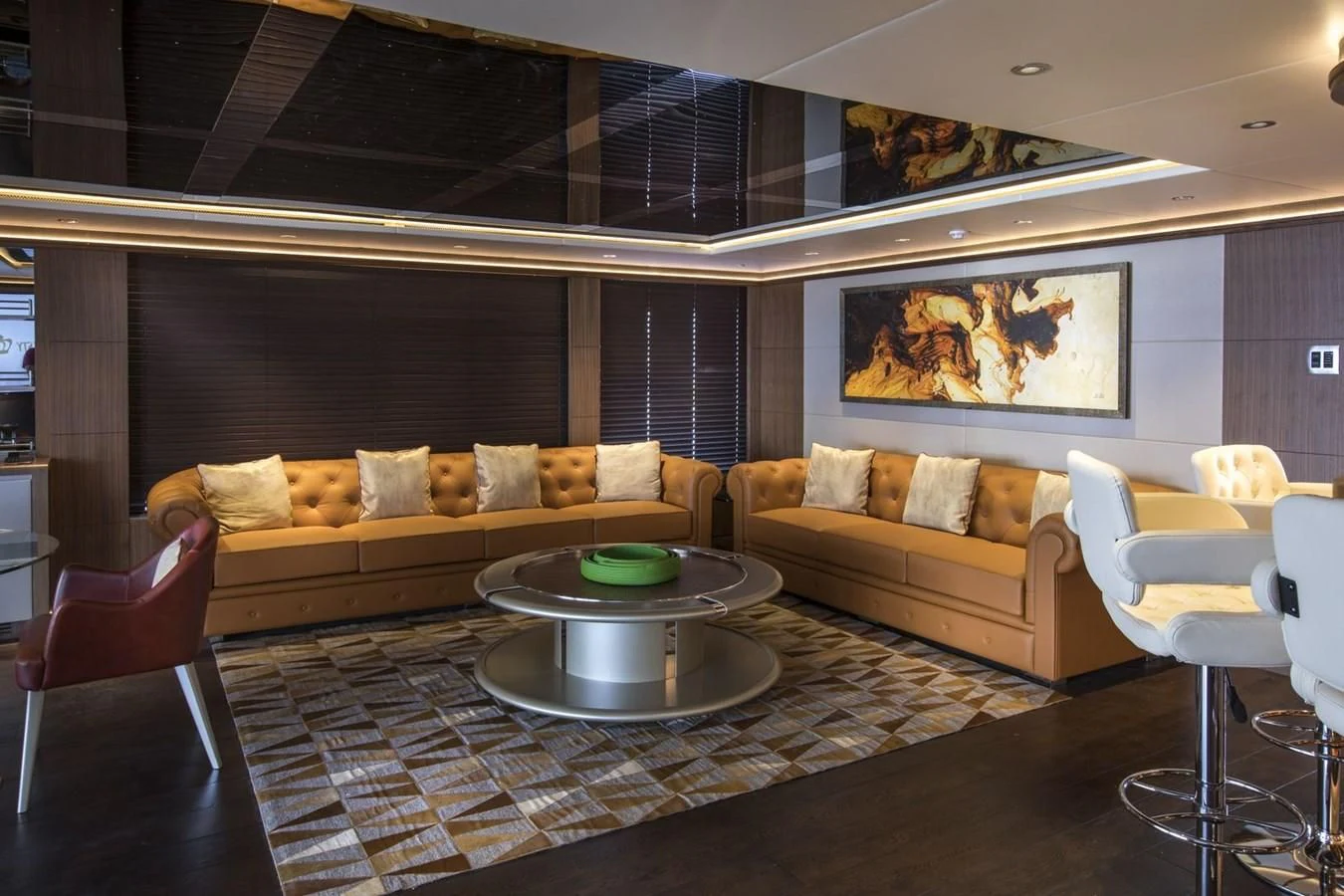 a living room with a couch and a table aboard MAJESTY 155 Yacht for Sale