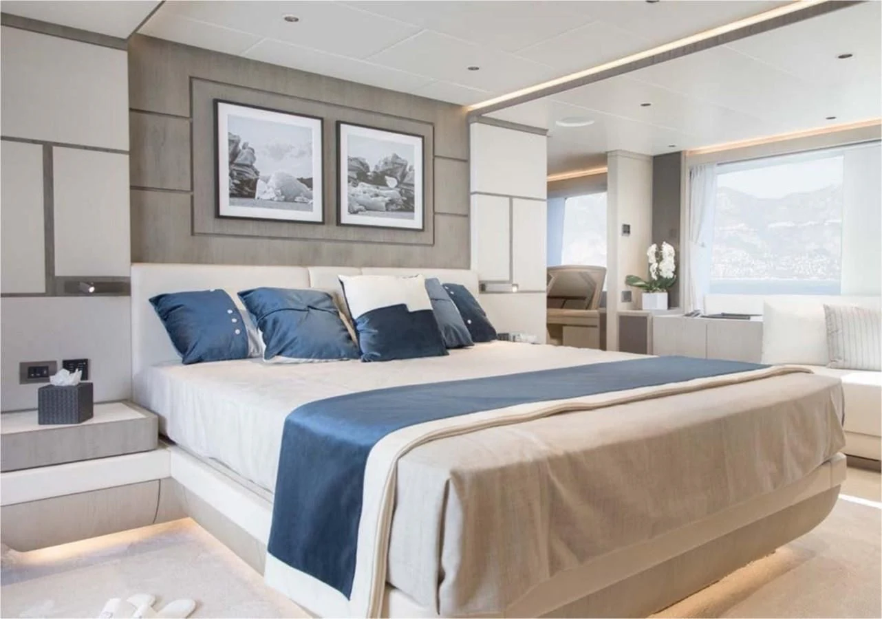 a large bed in a room aboard MAJESTY 155 Yacht for Sale