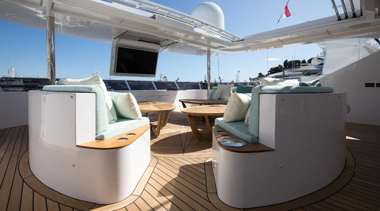 a room with a table and chairs aboard MAJESTY 155 Yacht for Sale