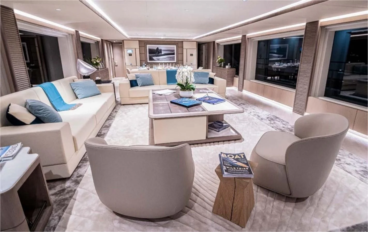 a living room with a couch and a table aboard MAJESTY 155 Yacht for Sale