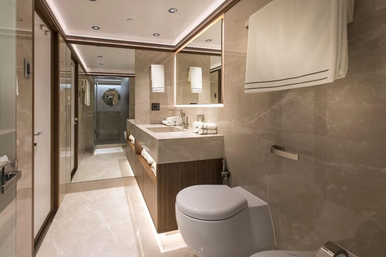 a bathroom with a toilet and a sink aboard MAJESTY 155 Yacht for Sale