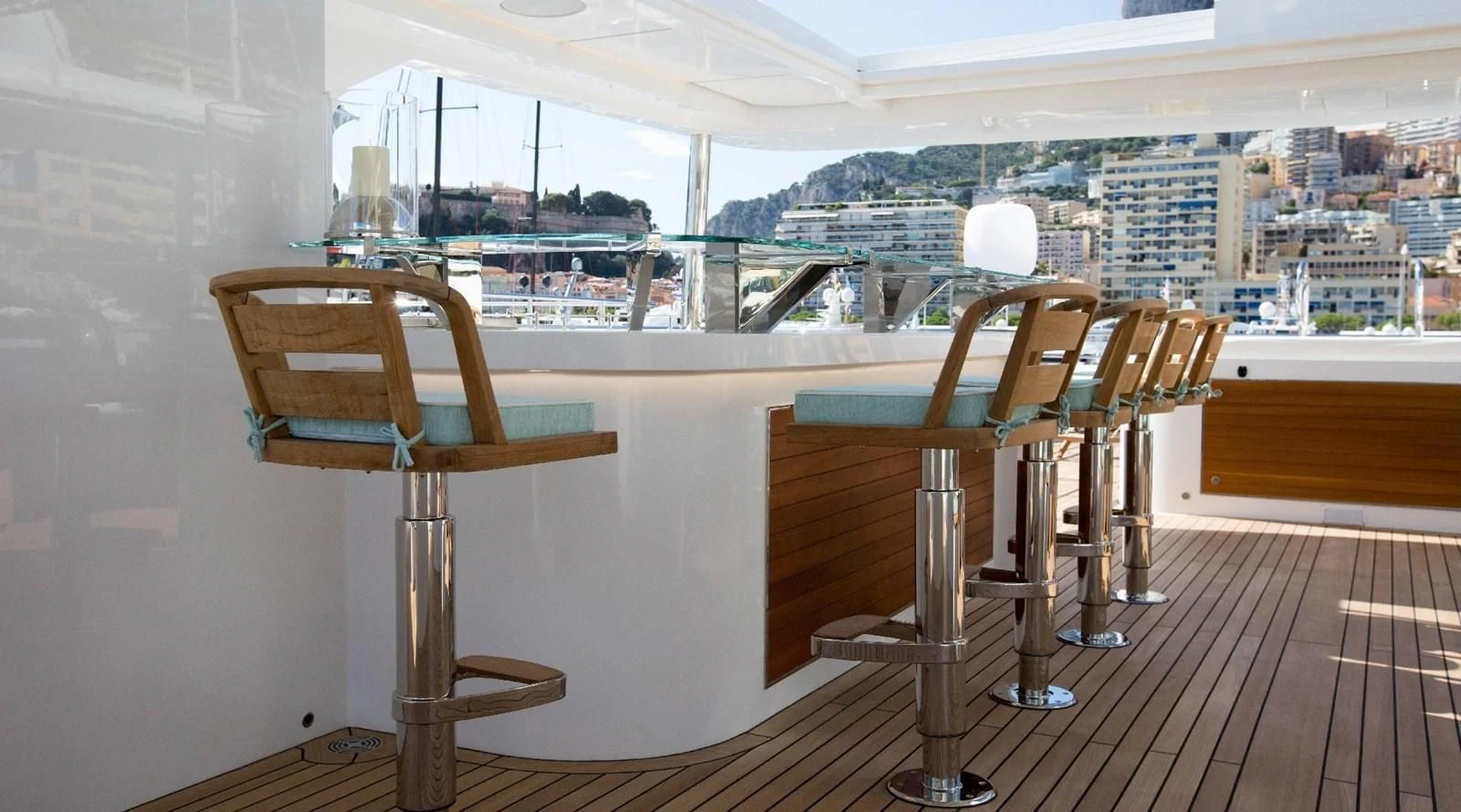 a table and chairs in a room aboard MAJESTY 155 Yacht for Sale