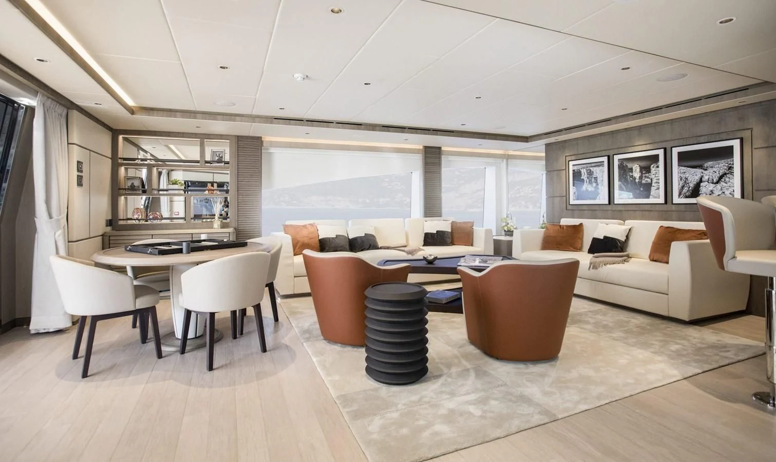 a living room with a couch and a table aboard MAJESTY 155 Yacht for Sale