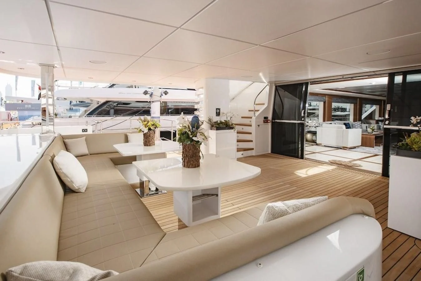 a modern looking living room aboard MAJESTY 155 Yacht for Sale