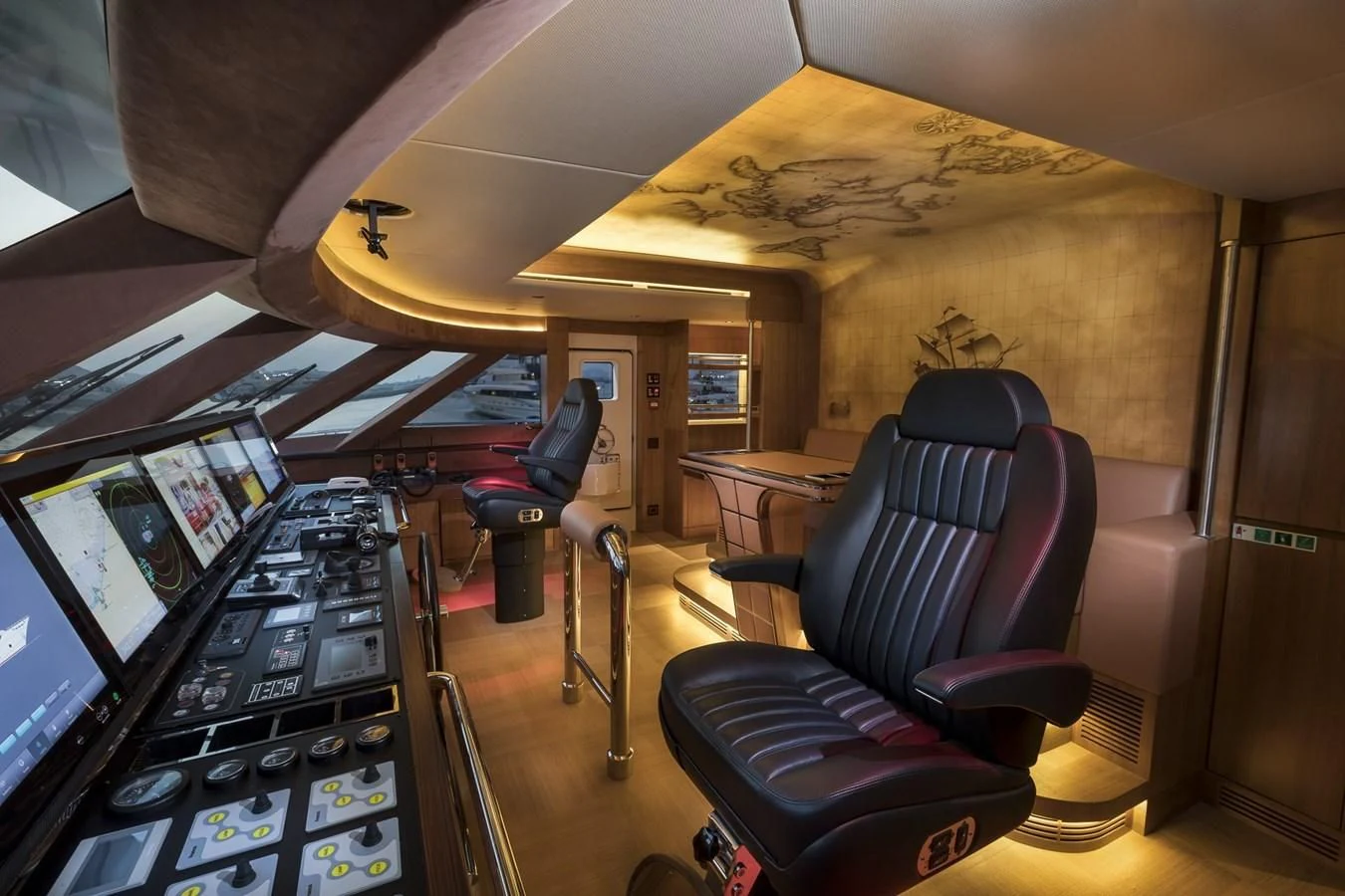 a room with a desk and chairs aboard MAJESTY 155 Yacht for Sale