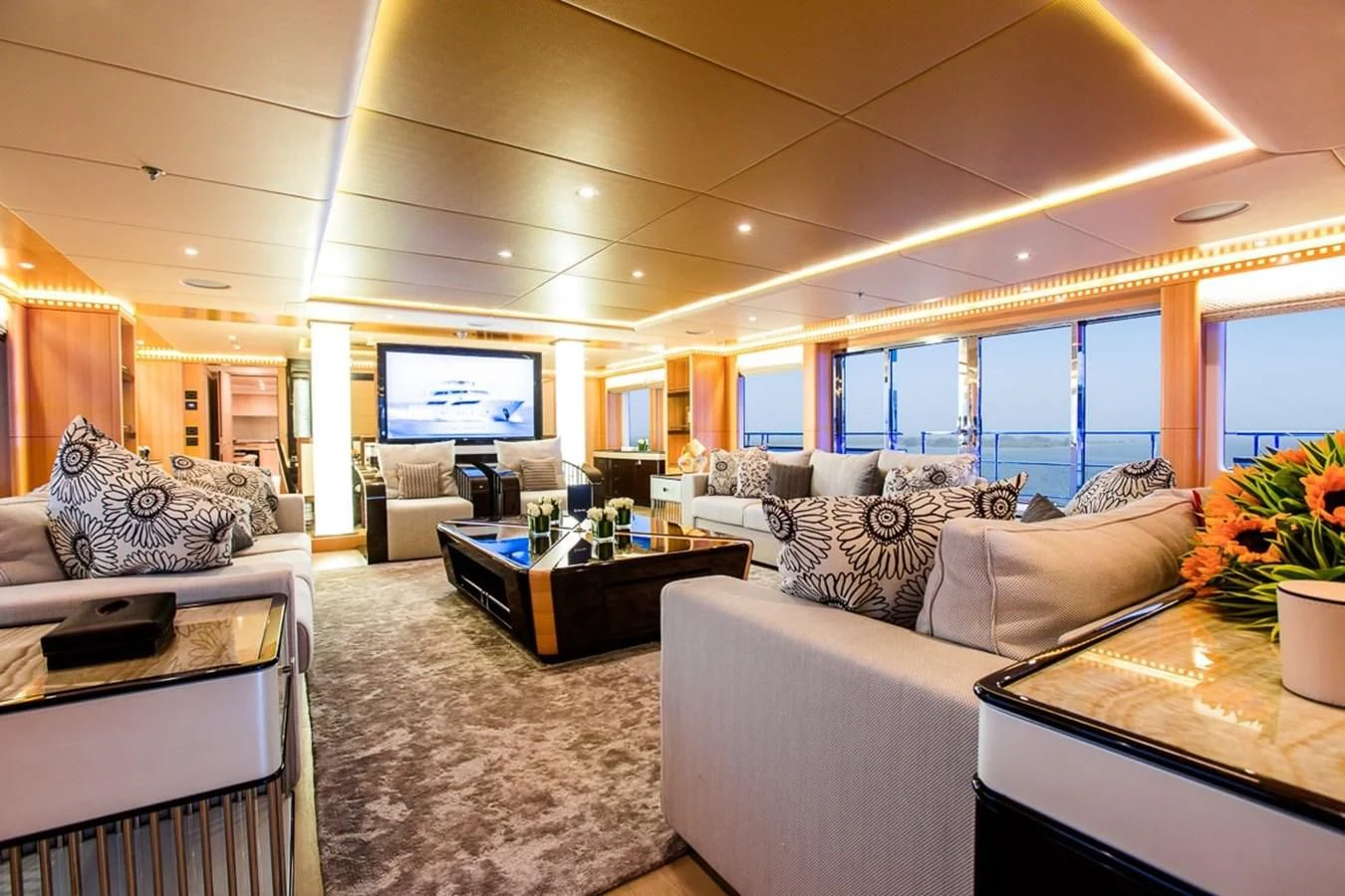a living room with a large window aboard MAJESTY 155 Yacht for Sale