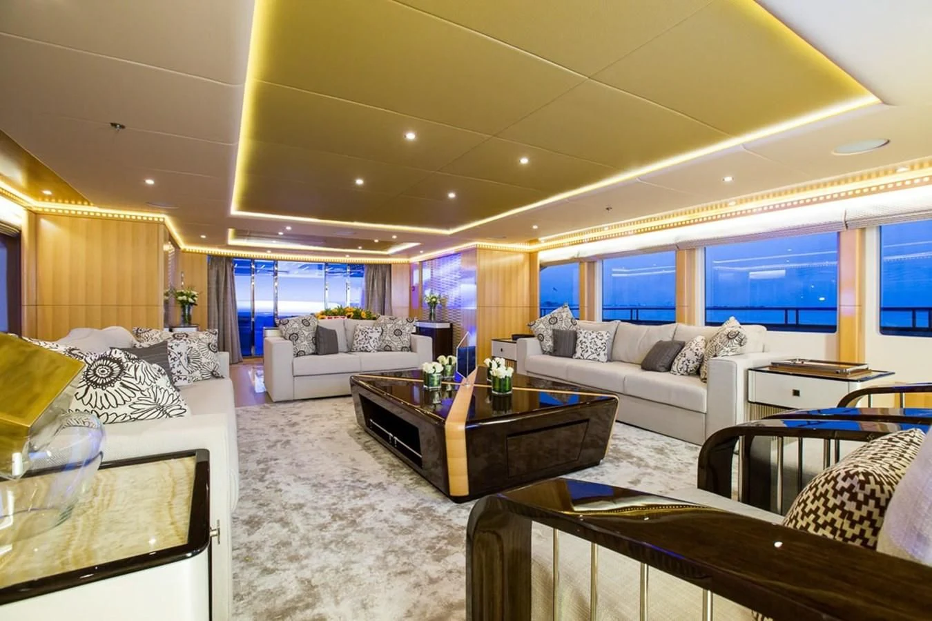 a living room with a large window aboard MAJESTY 155 Yacht for Sale