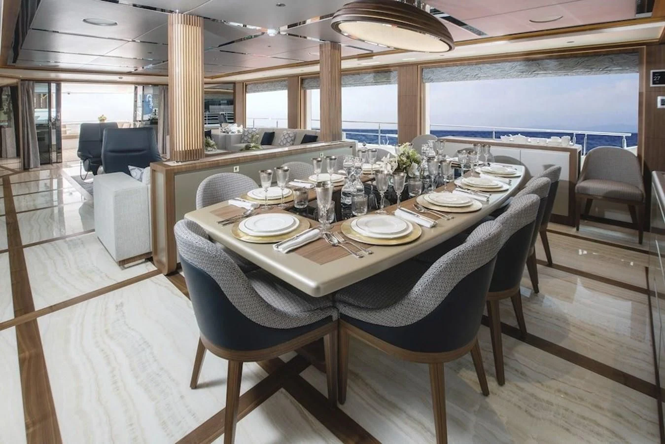 a dining table set for a dinner aboard MAJESTY 155 Yacht for Sale