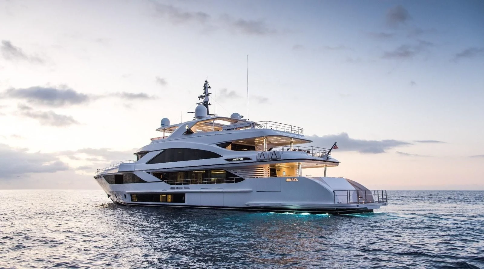 a large white boat in the water aboard MAJESTY 155 Yacht for Sale