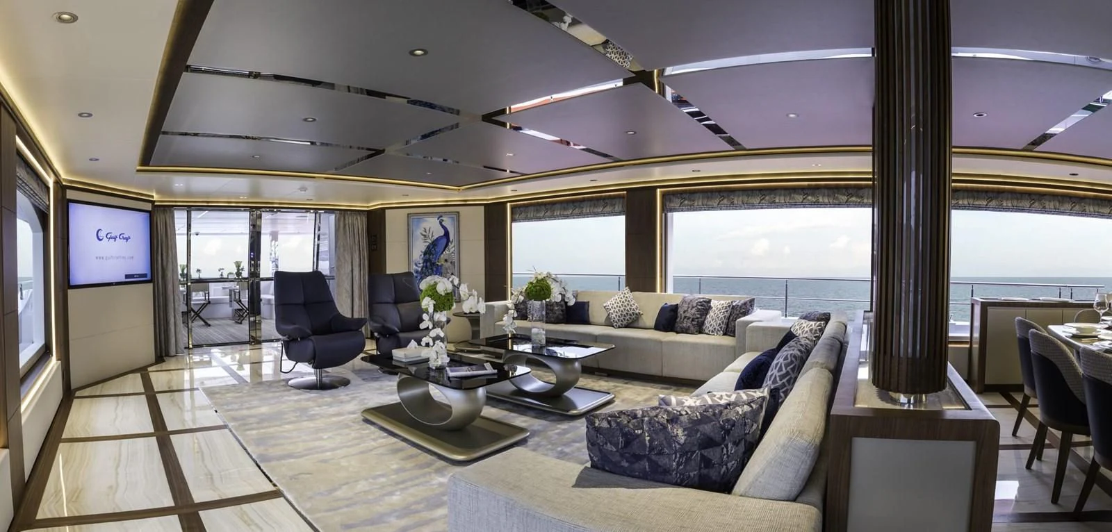 a living room with a large window aboard MAJESTY 155 Yacht for Sale
