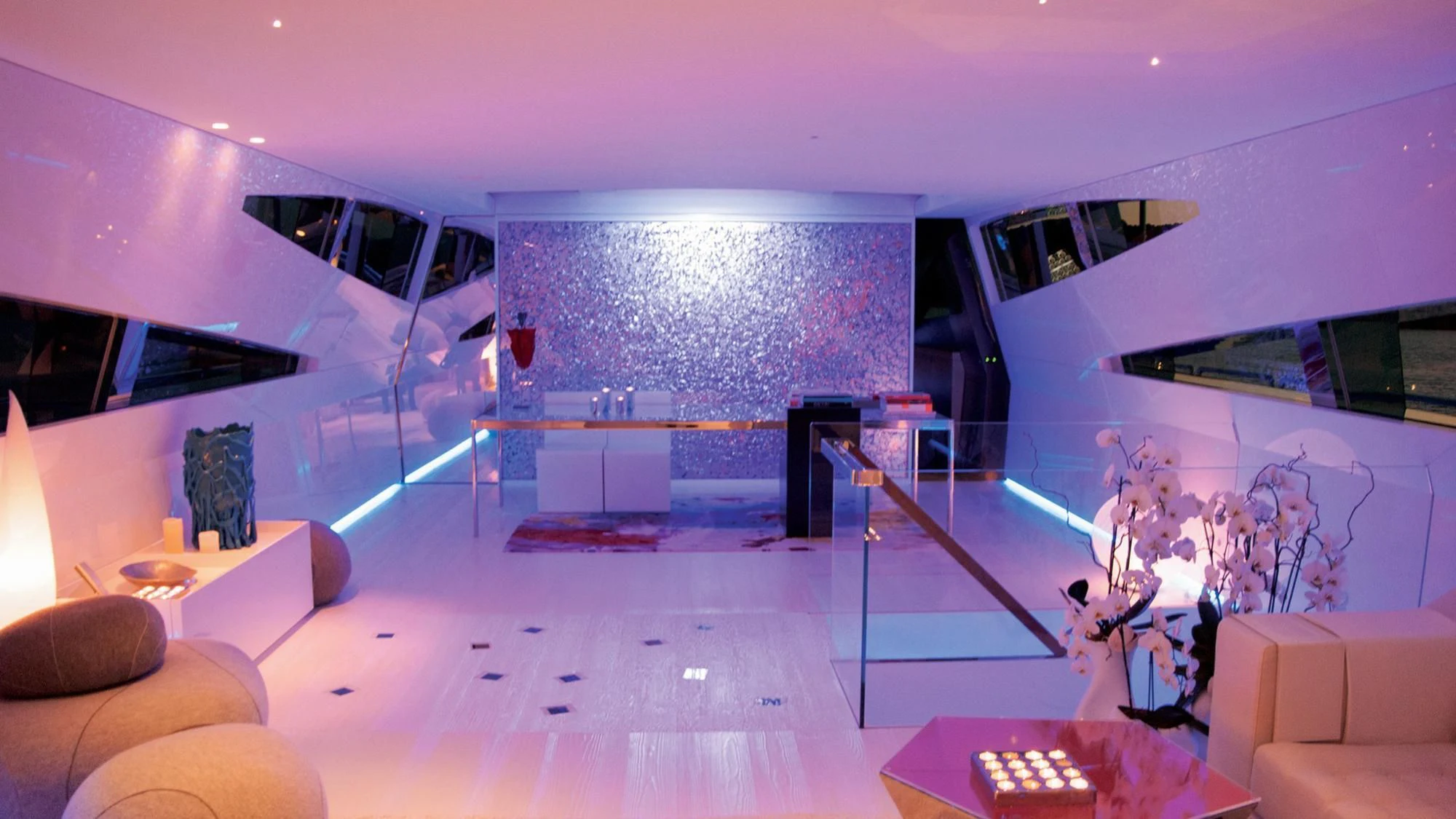 a room with a large glass wall aboard FLYING DAGGER Yacht for Sale