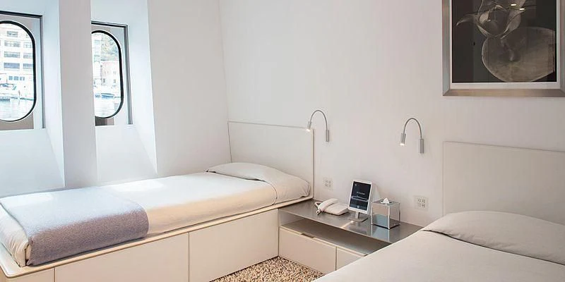 a room with two beds aboard FLYING DAGGER Yacht for Sale