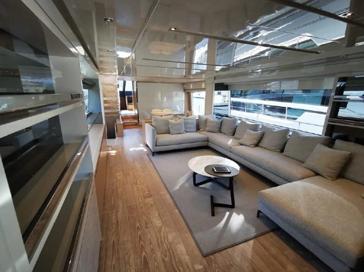 a living room with a large window aboard Y2 Yacht for Sale