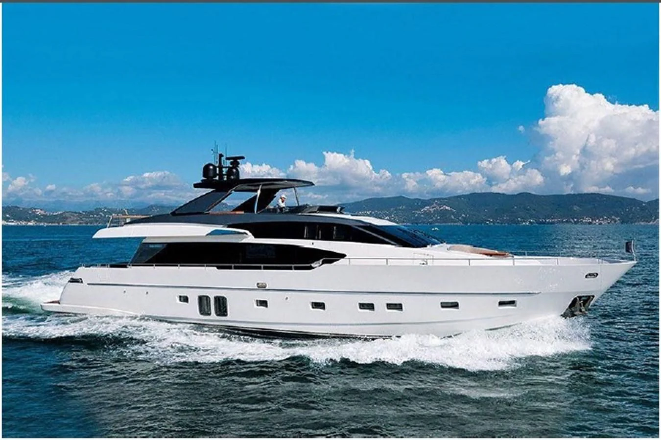 a white yacht on the water aboard Y2 Yacht for Sale