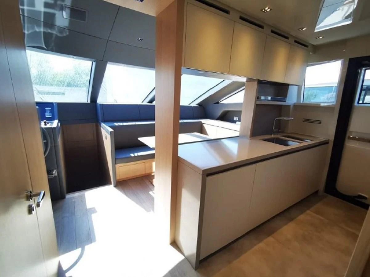 a kitchen with a large window aboard Y2 Yacht for Sale