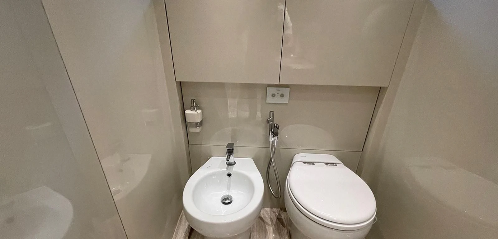 a bathroom with a toilet and sink aboard Y2 Yacht for Sale