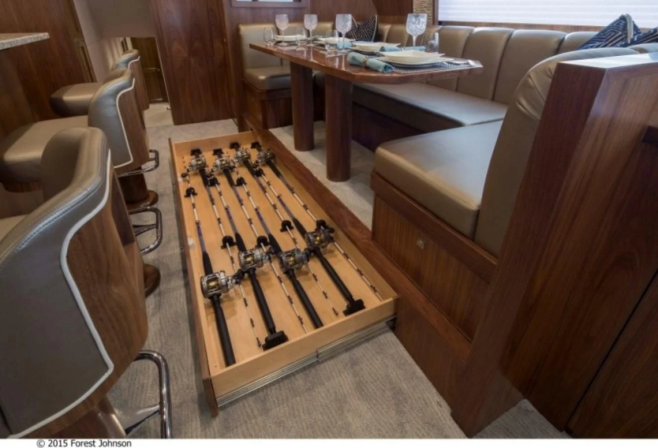 a wooden table with a chair aboard 80'VIKING 2018 Yacht for Sale