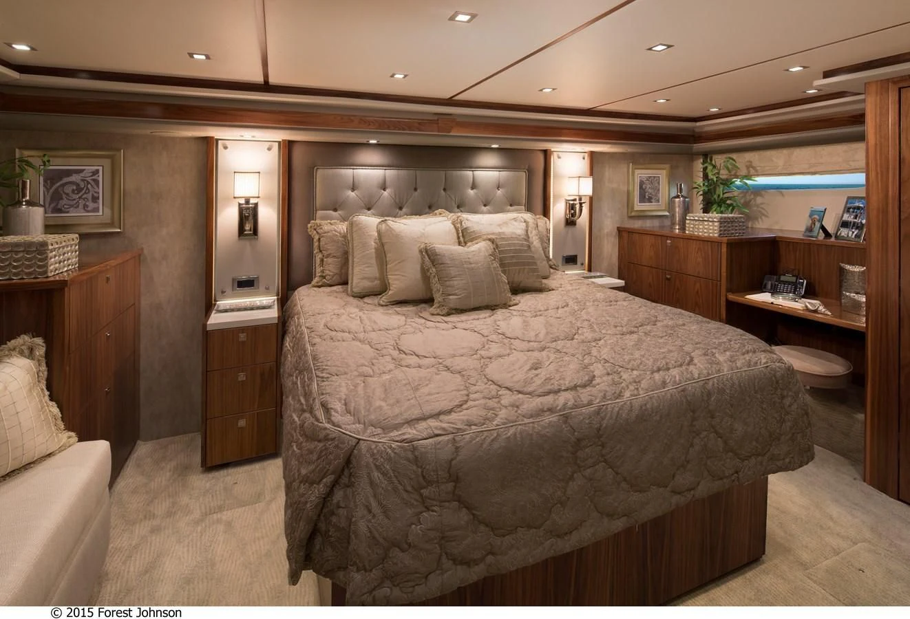 a large bed in a room aboard 80'VIKING 2018 Yacht for Sale