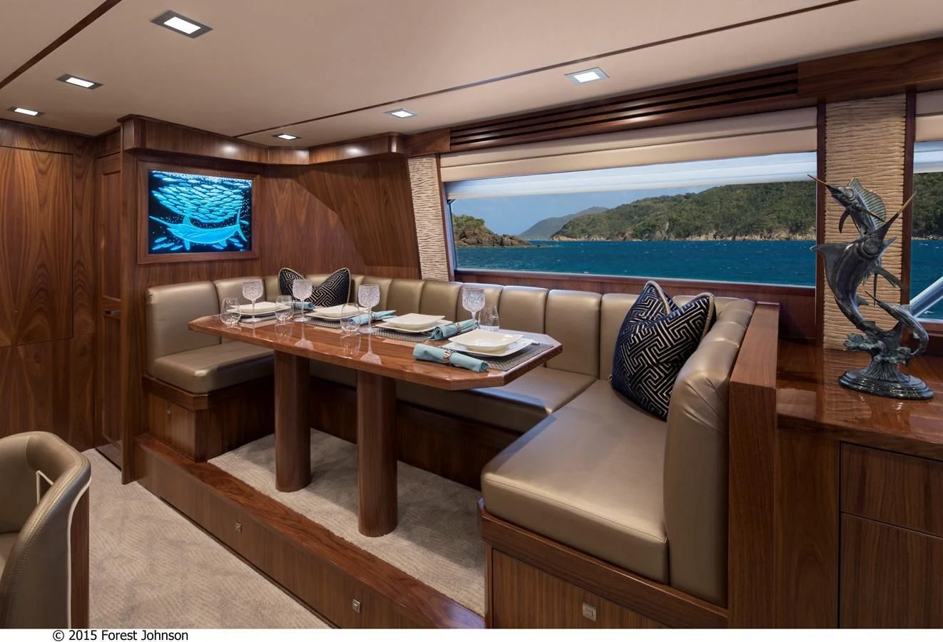 a living room with a large window aboard 80'VIKING 2018 Yacht for Sale