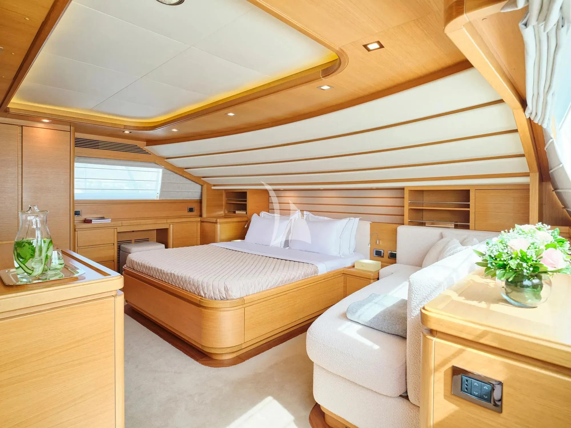 a room with a bed and a table aboard WATCH ME Yacht for Charter