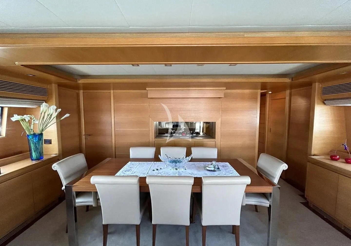 a dining room with a table aboard WATCH ME Yacht for Charter