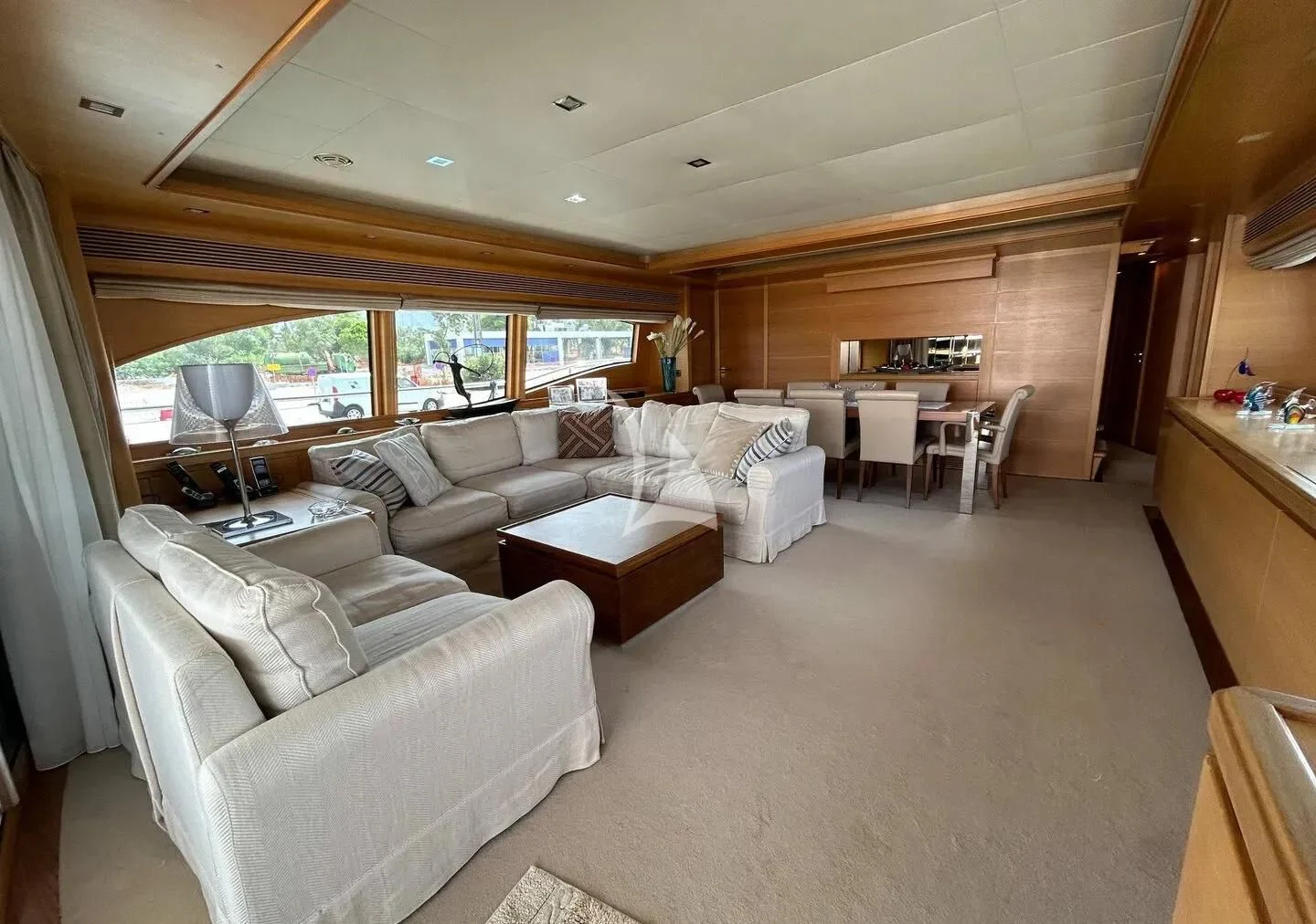 a living room with a couch and a table aboard WATCH ME Yacht for Charter