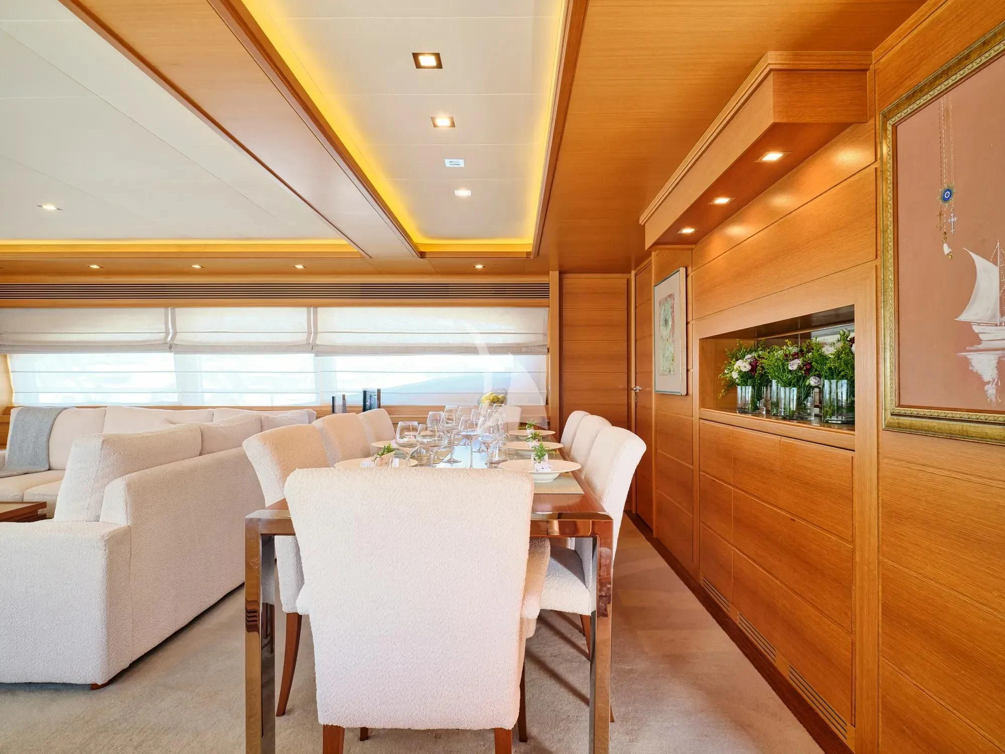 a dining room with a table aboard WATCH ME Yacht for Charter