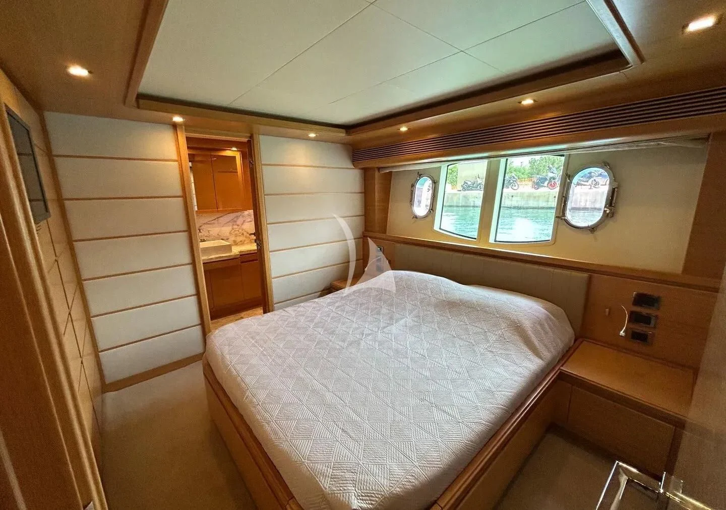a bed in a room aboard WATCH ME Yacht for Charter