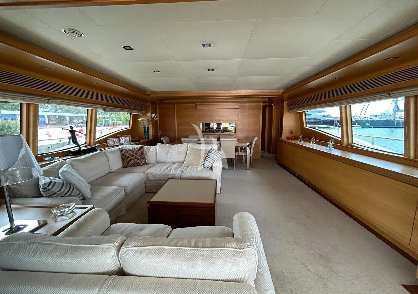 a living room with a large window aboard WATCH ME Yacht for Charter