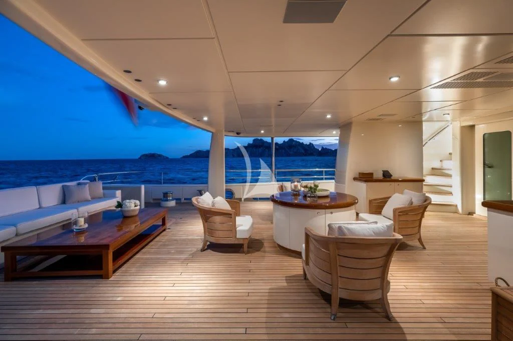 a room with a table and chairs aboard GRACE (YET) Yacht for Sale