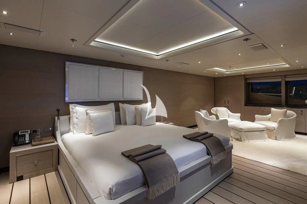 a room with a bed and a television aboard GRACE (YET) Yacht for Sale