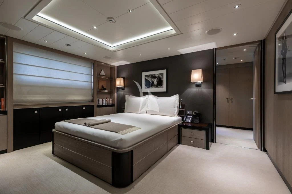 a large bedroom with a large bed aboard GRACE (YET) Yacht for Sale