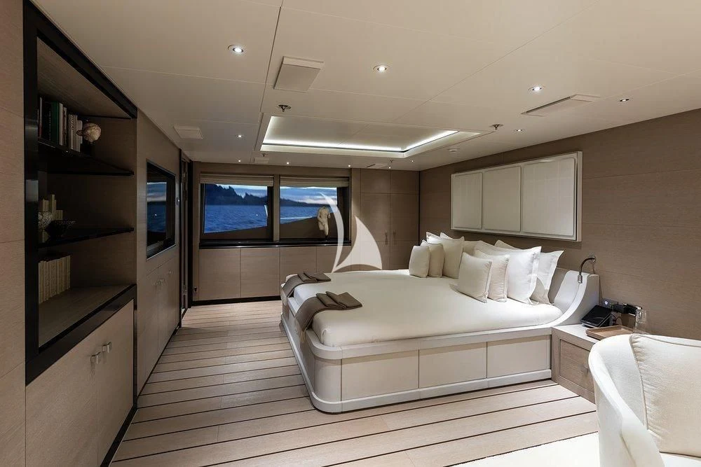 a room with a bed and a tv aboard GRACE (YET) Yacht for Sale