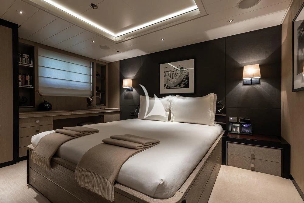 a bedroom with a large bed aboard GRACE (YET) Yacht for Sale