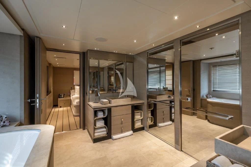 a large bathroom with a large glass shower unit aboard GRACE (YET) Yacht for Sale