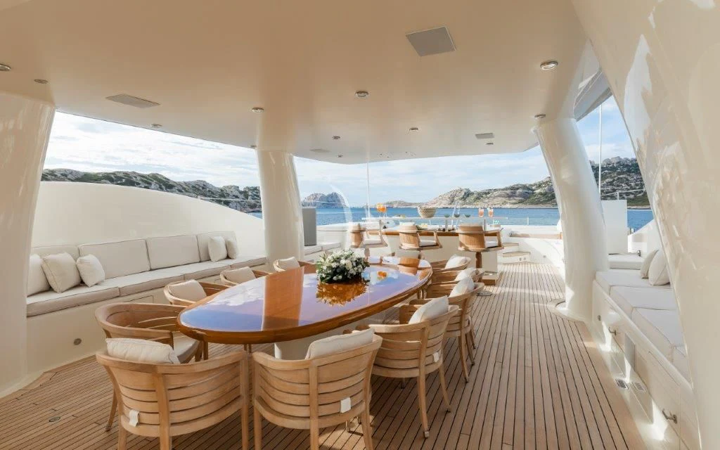 a room with a table and chairs aboard GRACE (YET) Yacht for Sale