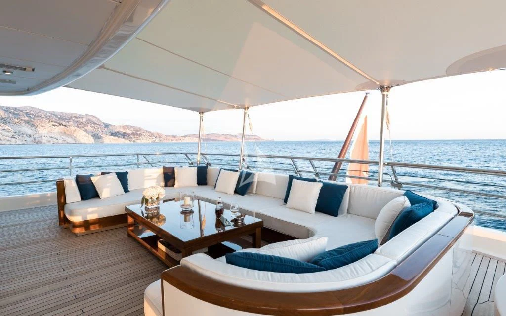 a large white tent with a table and chairs on it aboard GRACE (YET) Yacht for Sale